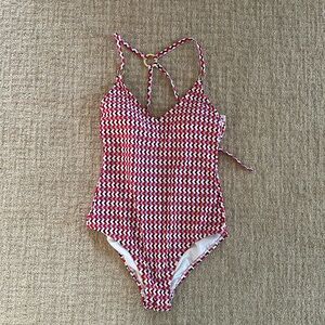 Super cute Kona Sol size medium one piece with stylish strappy back